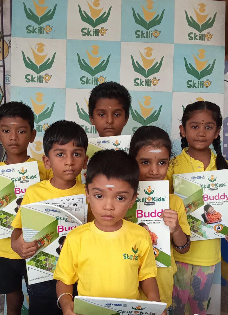 children focused during abacus practice session